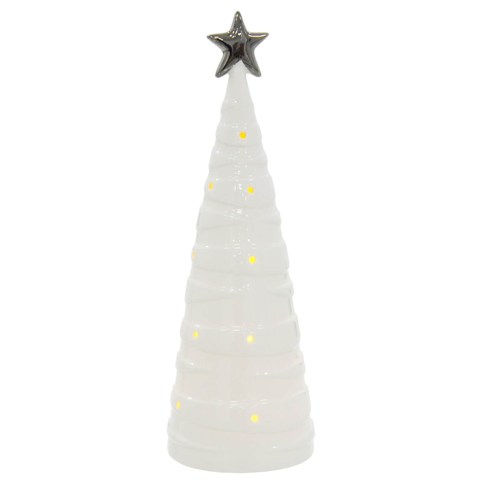 White ceramic Christmas tree shape ornament with warm white LED light shining through cut away baubles and topped with a silver star